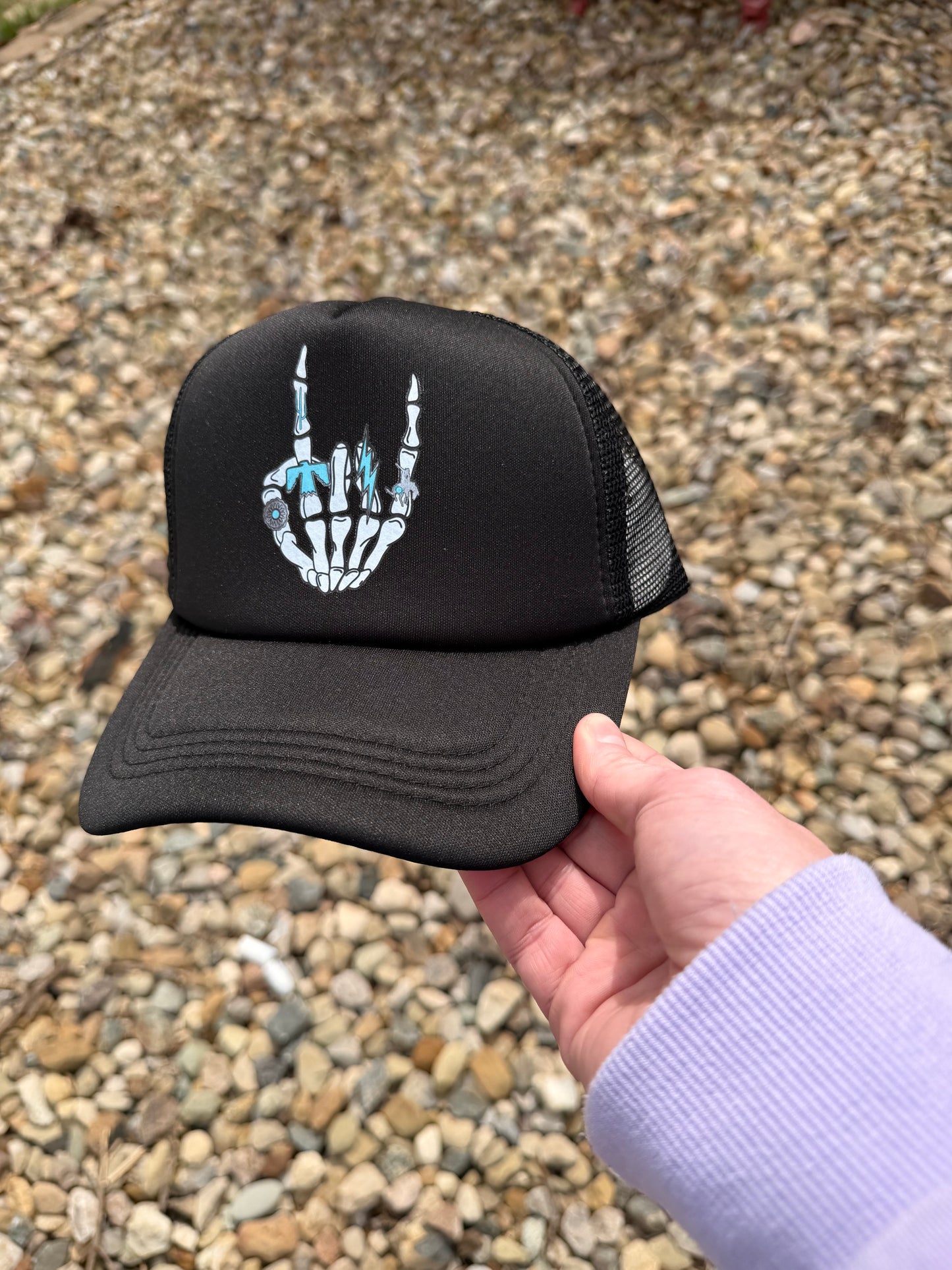 Rock On Skeleton Hand Trucker Hat