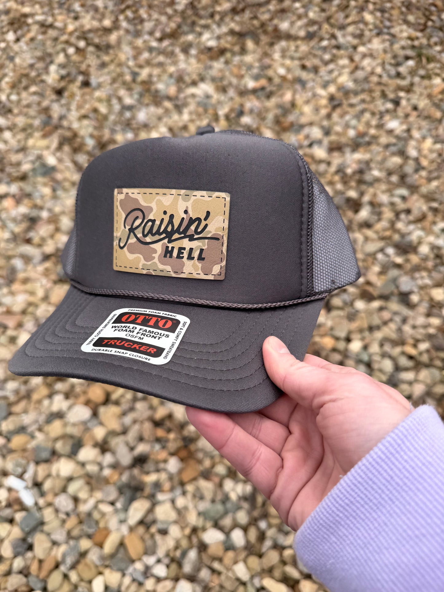 Raisin’ Hell Trucker Hat